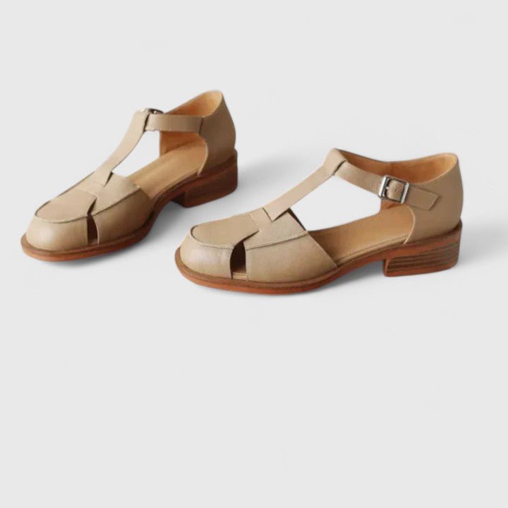 Isara | Low block heel sandals with side cut - out detail