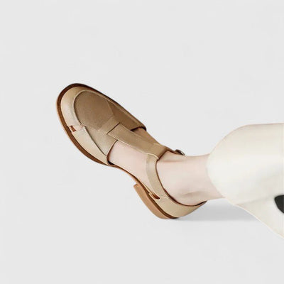 Isara | Low block heel sandals with side cut - out detail