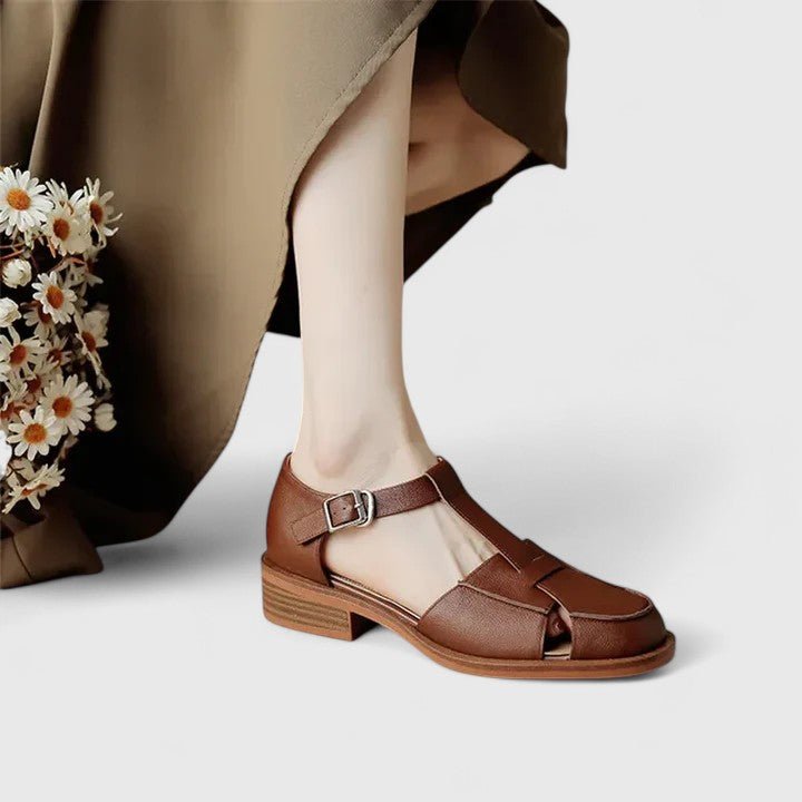 Isara | Low block heel sandals with side cut - out detail